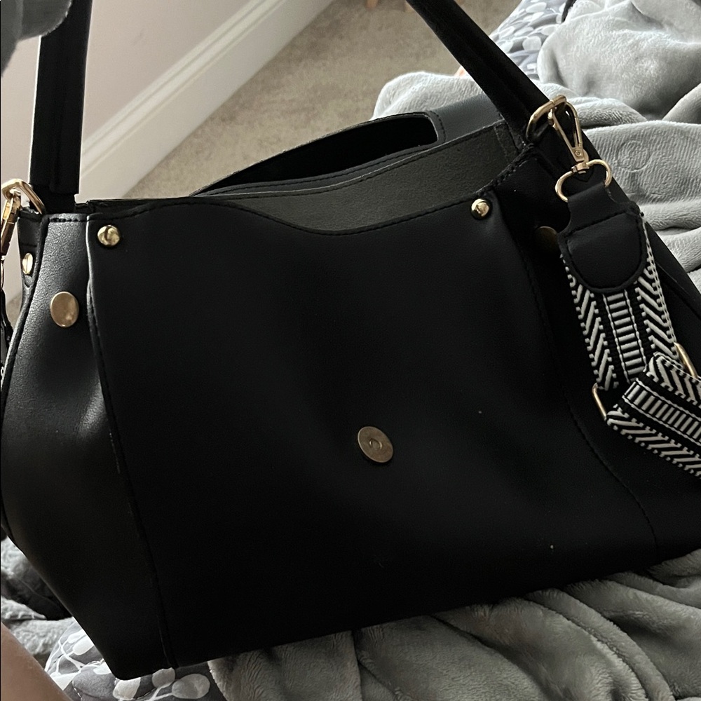 Elegant Black Handbag with Patterned Strap NWOT